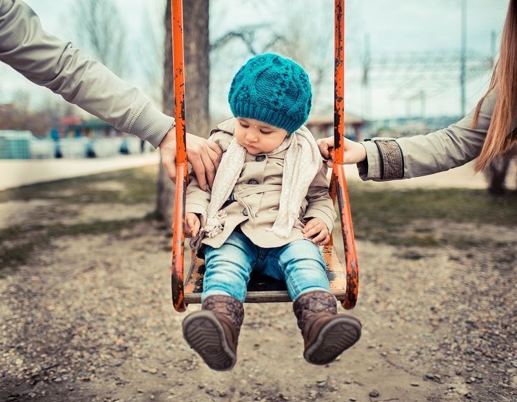 child on a swing - child support St. Louis MO